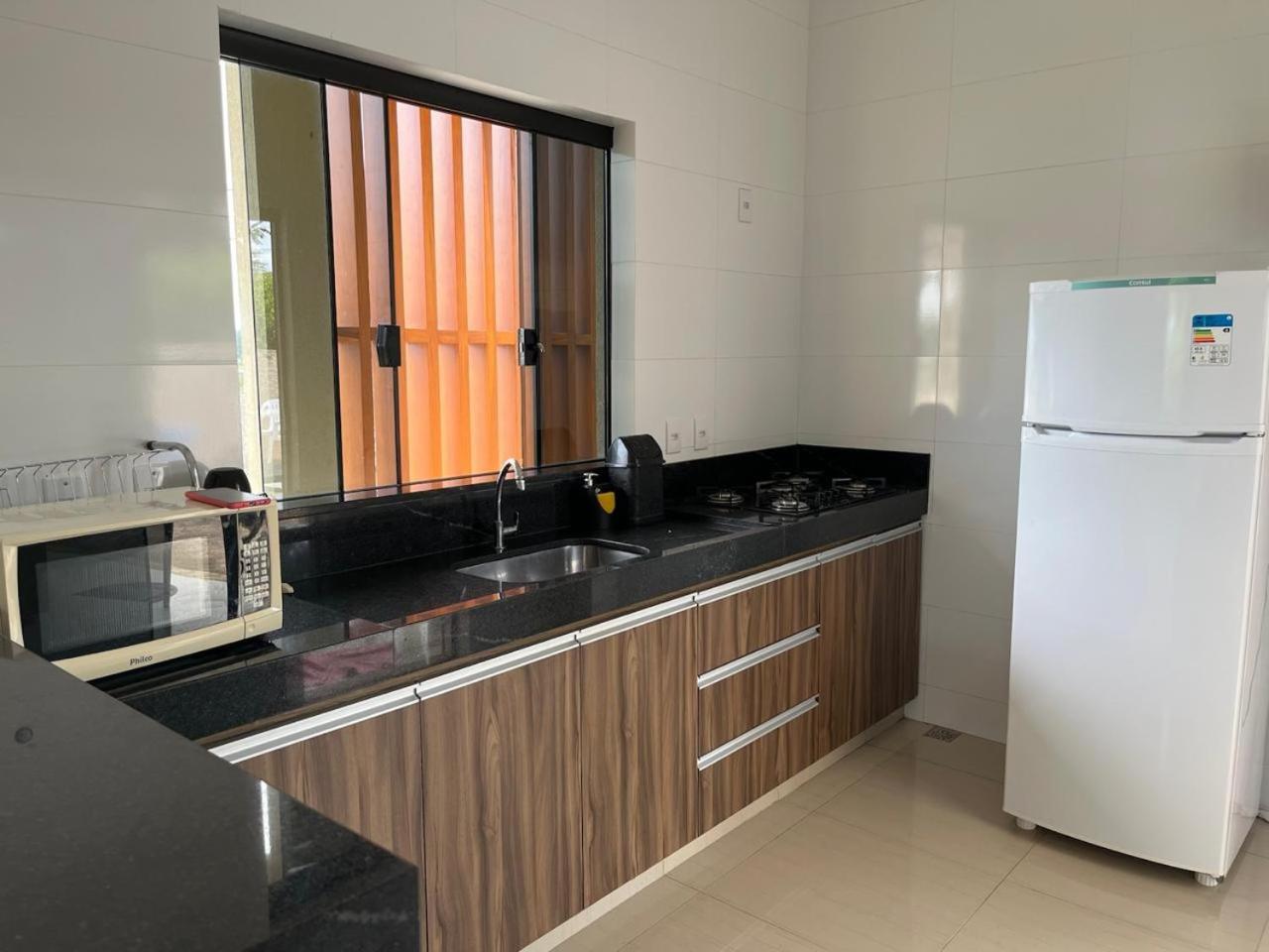 Casa Com Piscina Vista Para Lago, 03 Quartos Confortaveis กาปีตอลิโอ ภายนอก รูปภาพ