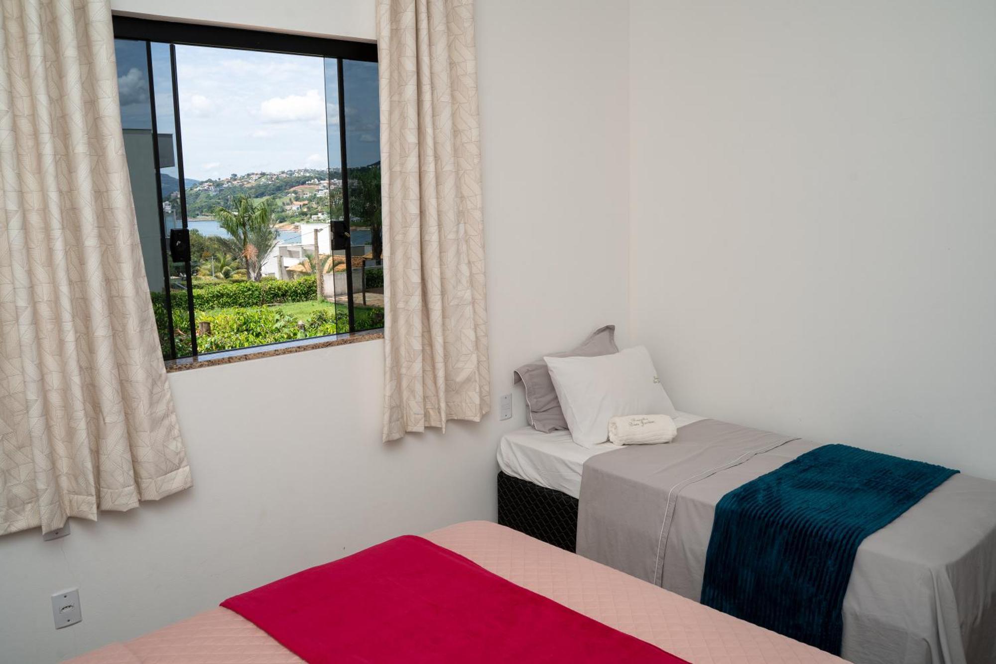 Casa Com Piscina Vista Para Lago, 03 Quartos Confortaveis กาปีตอลิโอ ภายนอก รูปภาพ