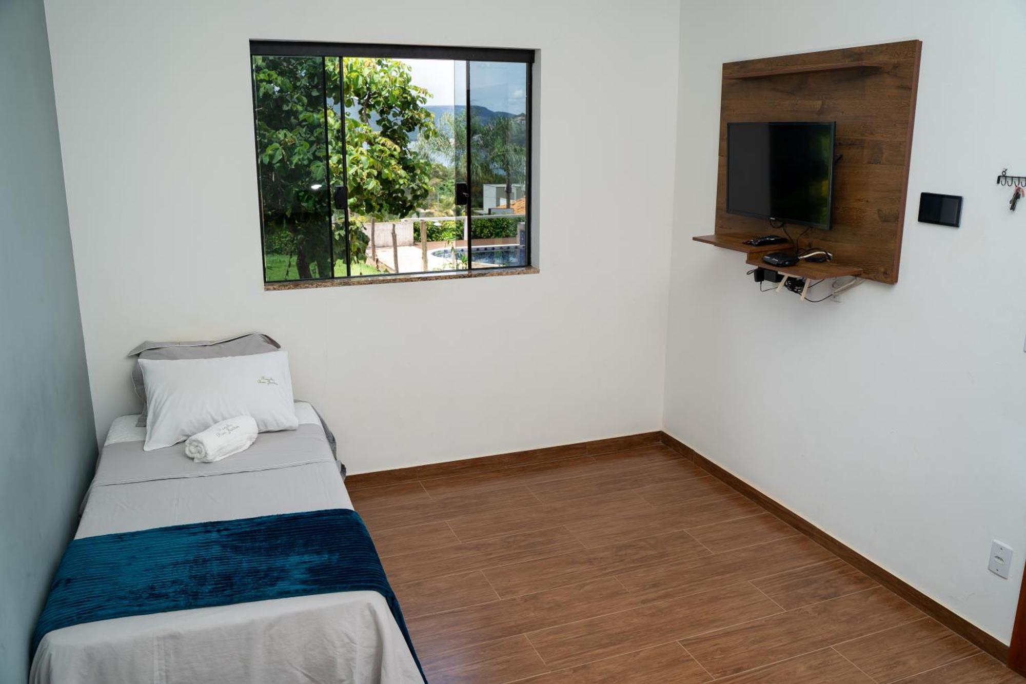 Casa Com Piscina Vista Para Lago, 03 Quartos Confortaveis กาปีตอลิโอ ภายนอก รูปภาพ