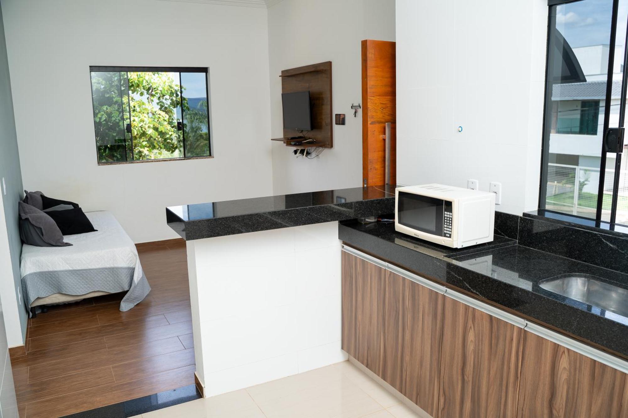 Casa Com Piscina Vista Para Lago, 03 Quartos Confortaveis กาปีตอลิโอ ภายนอก รูปภาพ