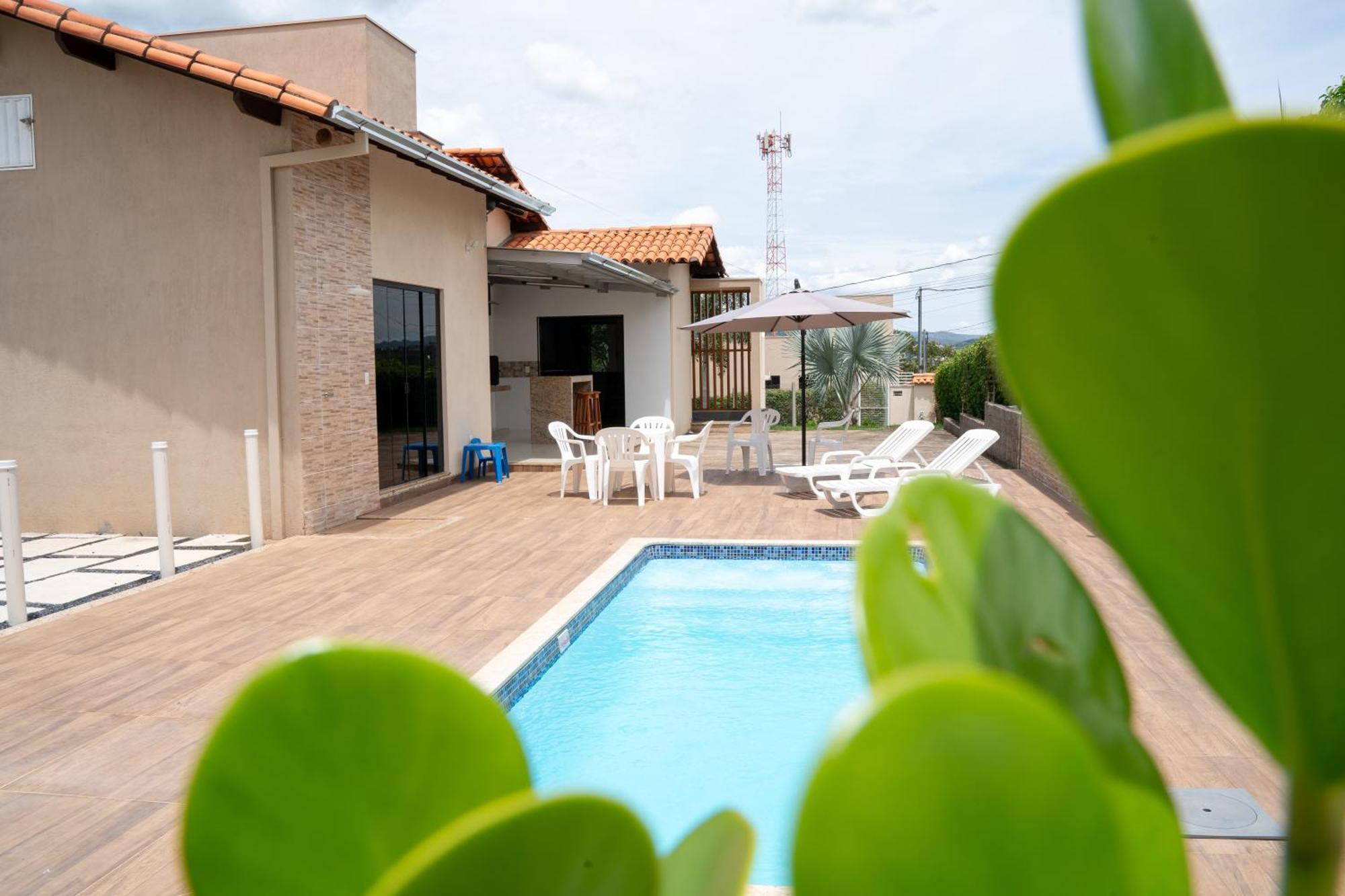 Casa Com Piscina Vista Para Lago, 03 Quartos Confortaveis กาปีตอลิโอ ภายนอก รูปภาพ