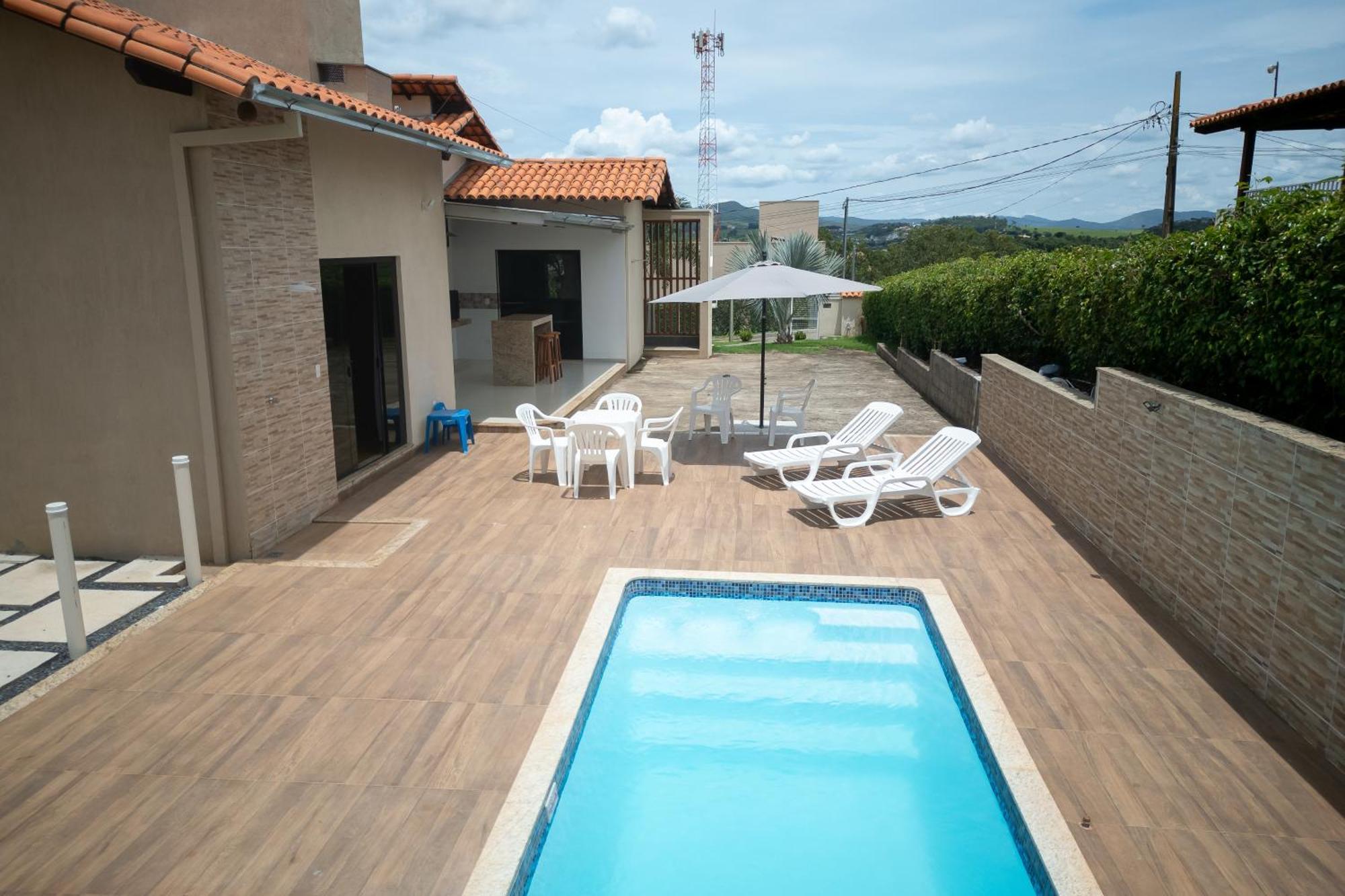 Casa Com Piscina Vista Para Lago, 03 Quartos Confortaveis กาปีตอลิโอ ภายนอก รูปภาพ